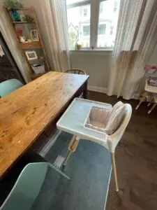 Organized dining room with clean table and good lighting