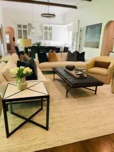 Modern, clean living room with organized furniture